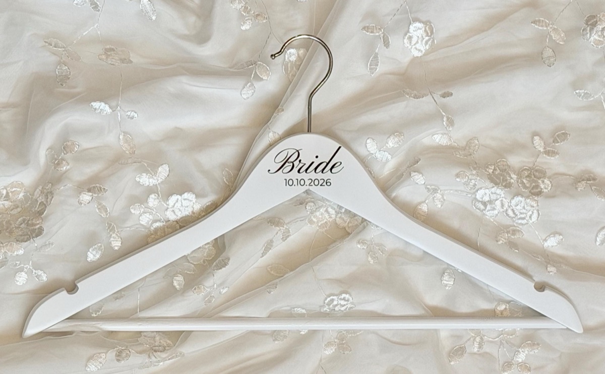 White hanger engraved Bride and date, seen whole